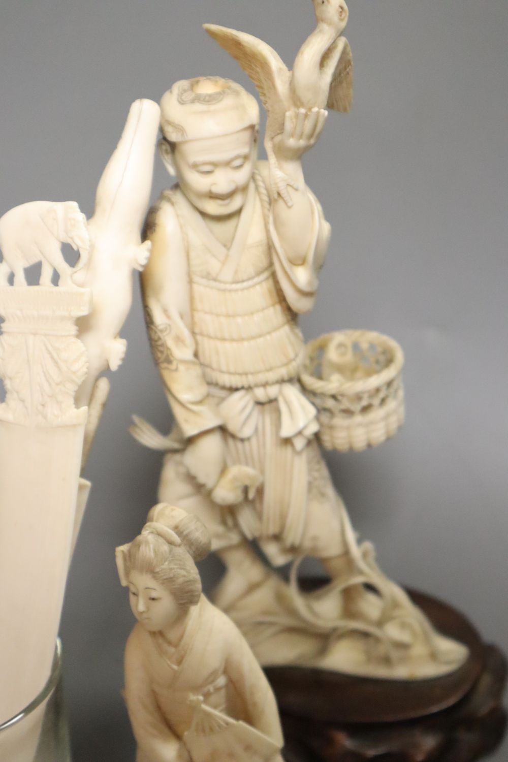 A group of Japanese and Chinese ivory figures and carvings, 19th/early 20th century, tallest 24cm